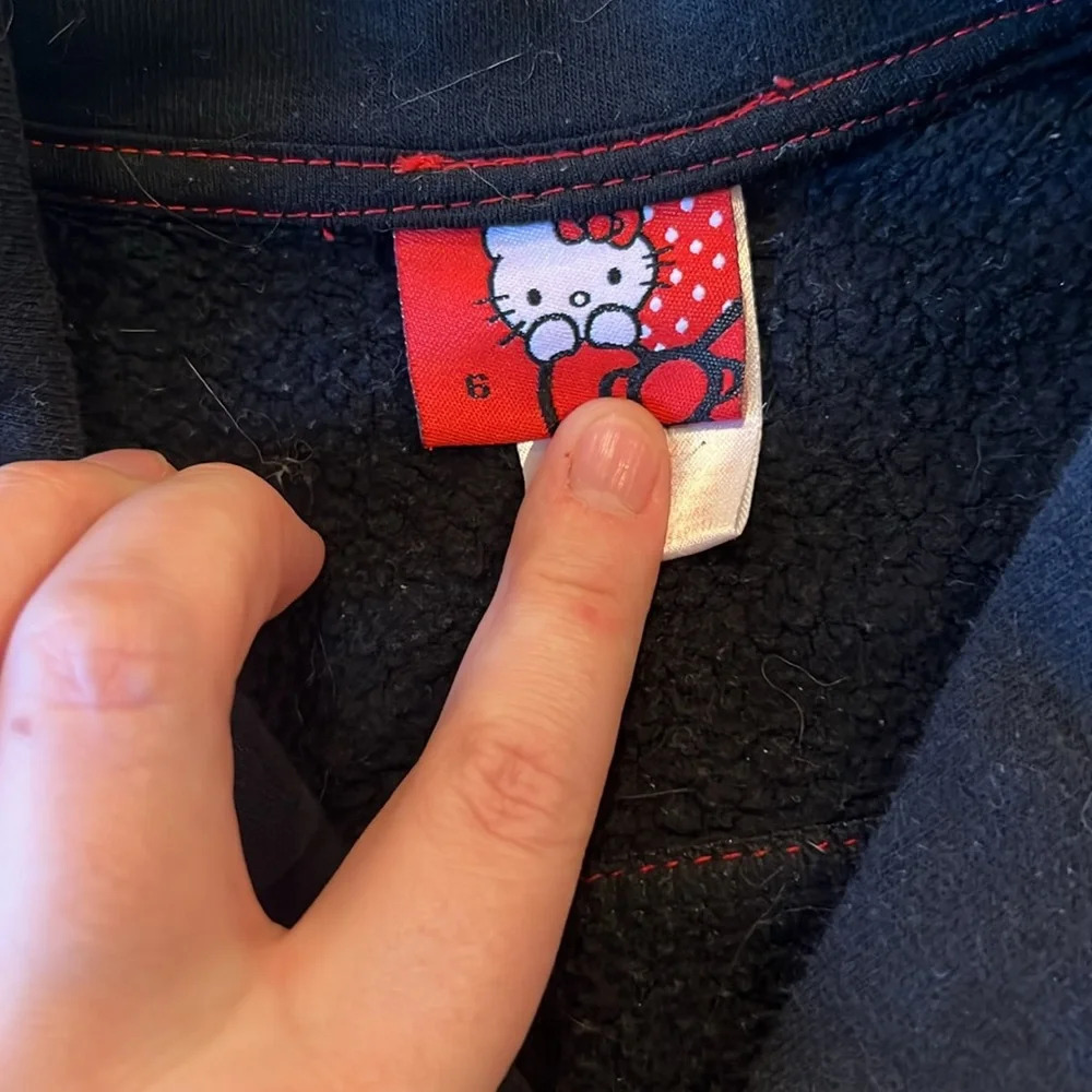 Sanrio Hello Kitty black and red zip up jacket. Sequin hello kitty back. Size 6 - Picture 3 of 6